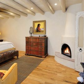 bedroom with gas fireplace