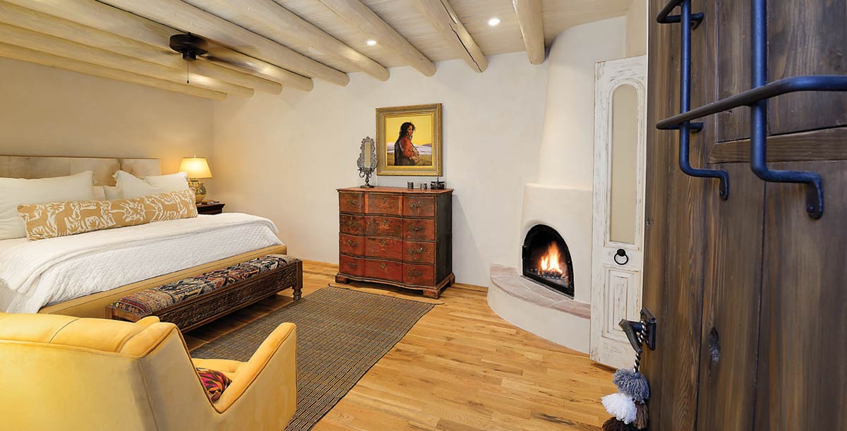 bedroom with gas fireplace