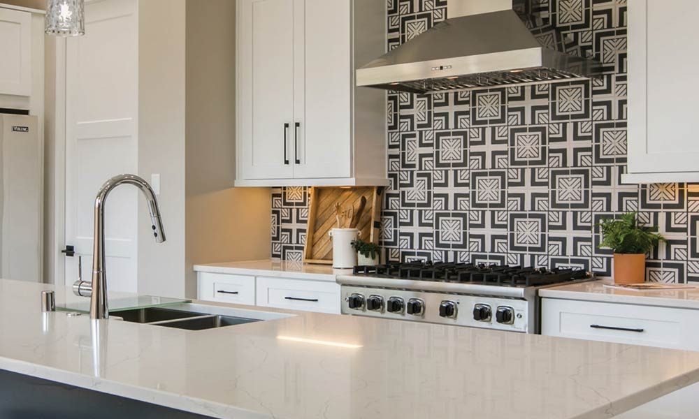 kitchen with geometric backsplash